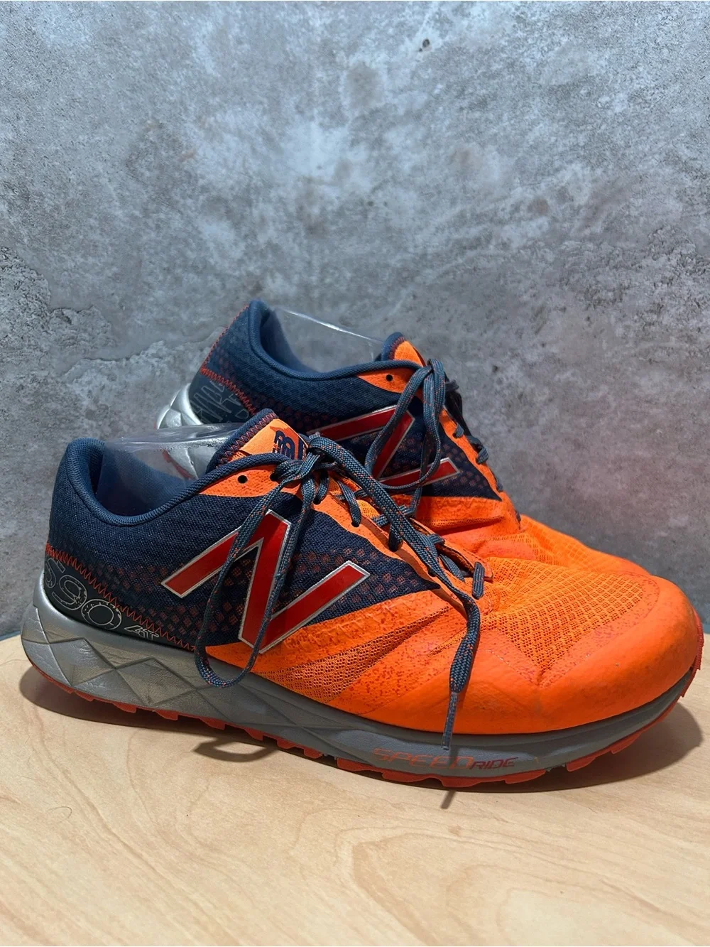 orange and blue New Balance 690 AT trail running shoes men’s size 10